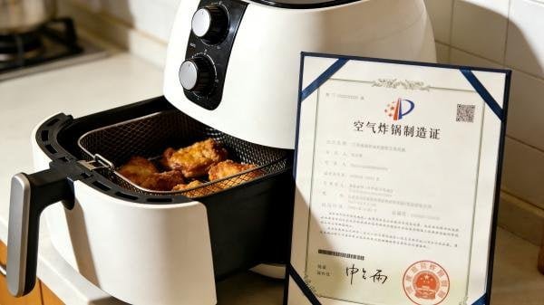 Certificates and licenses for air fryer manufacturing verification.