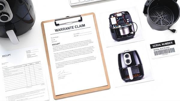 An organized file containing a receipt, a photo of a defective air fryer, and a document with the serial number highlighted.